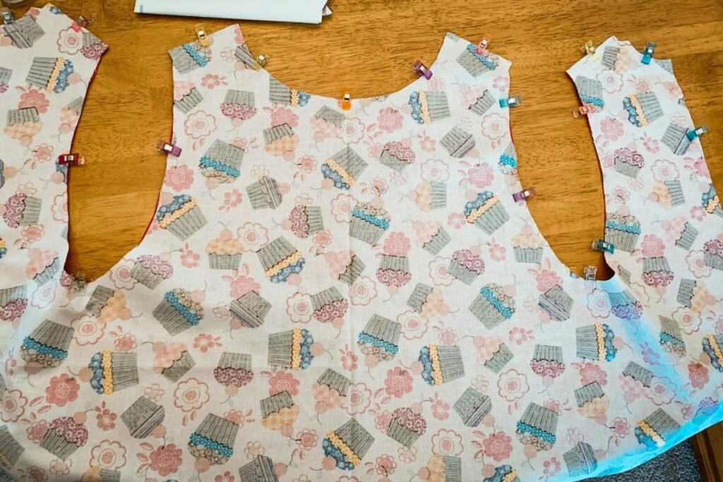 An image of pinned apron edges