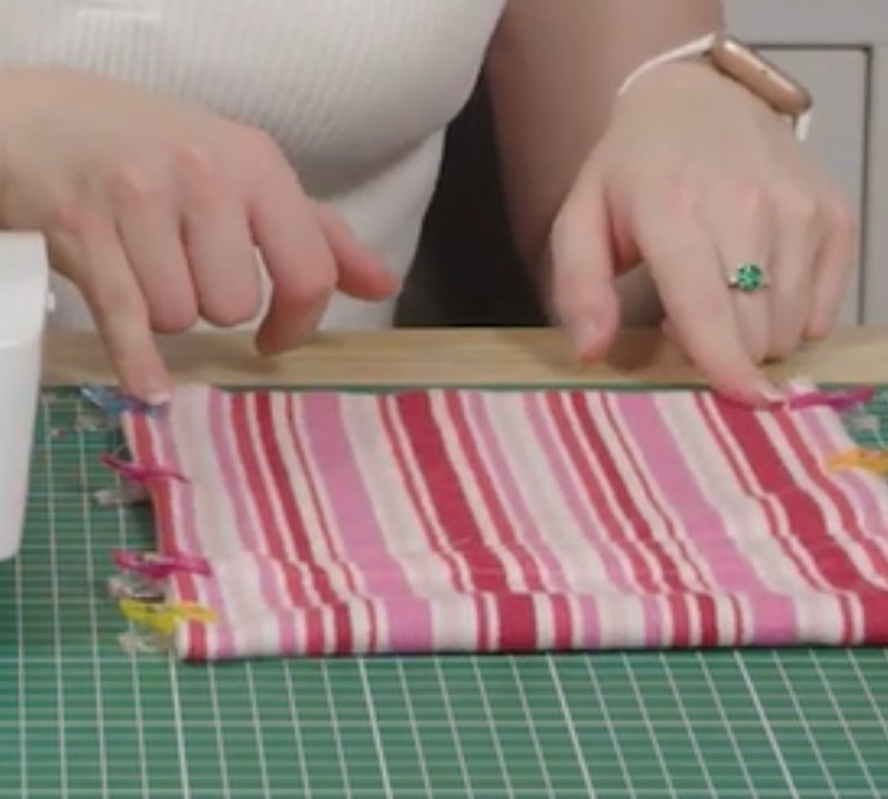 An image of mesh and fabric pieces pinned together