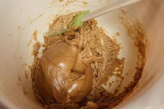 An image of peanut butter added to the mixture