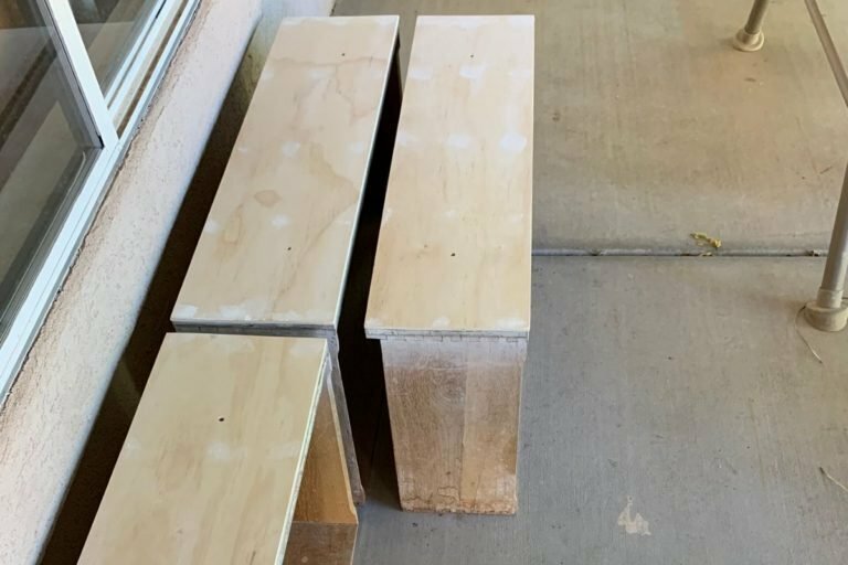 An image of a dresser drawer front being repaired